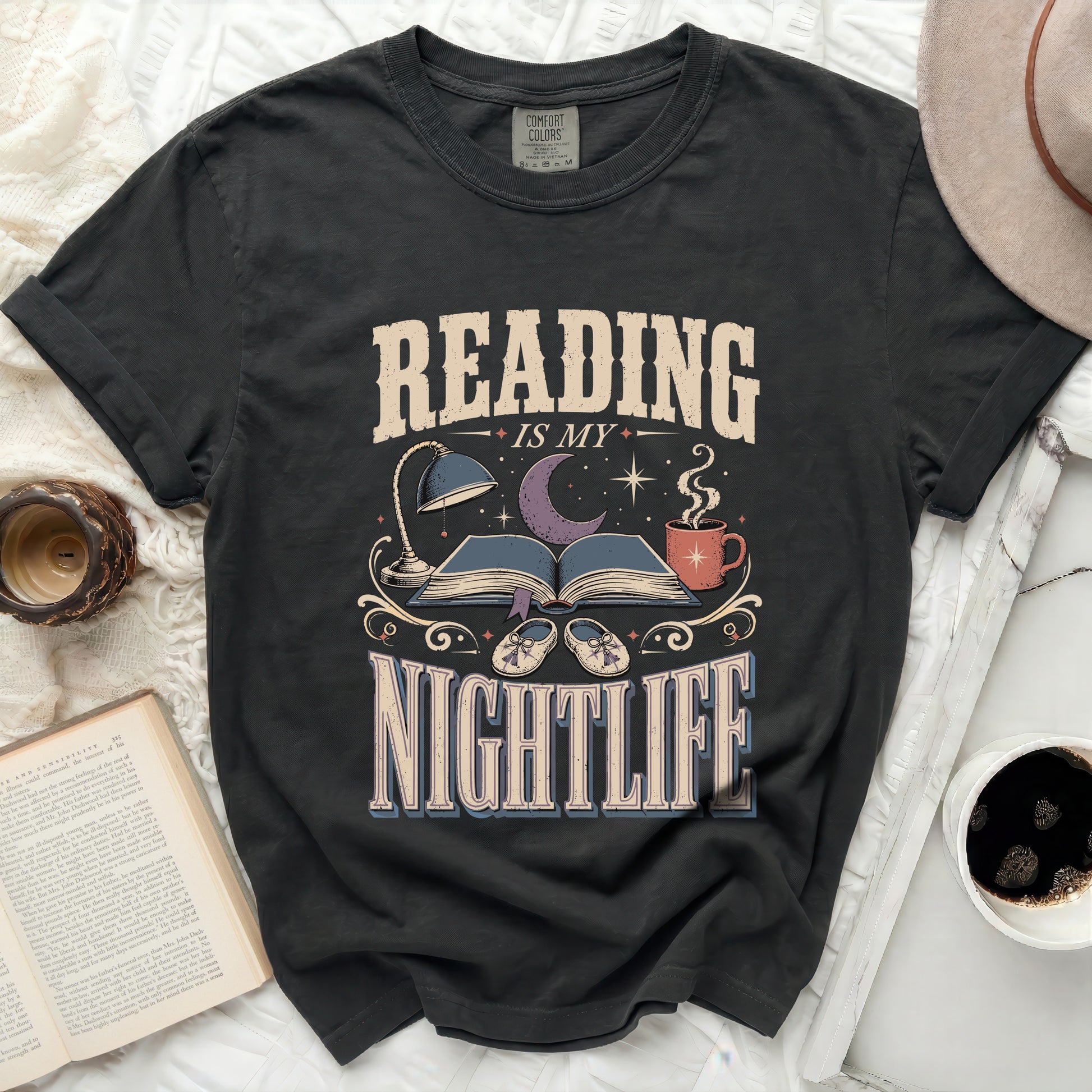 Black t-shirt with "Reading Is My Nightlife" graphic and book theme.