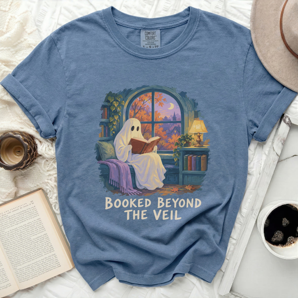 Ghost reading a book by a window with fall scenery, "Booked Beyond The Veil" text.