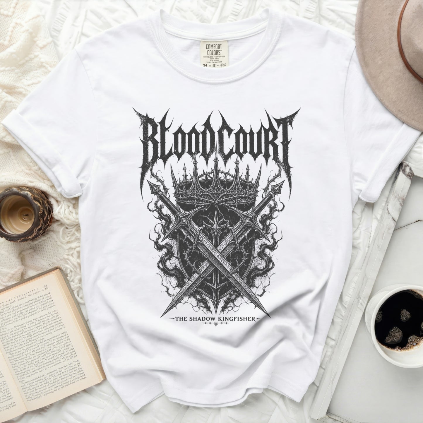 White t-shirt with "Blood Court" and crossed swords graphic.