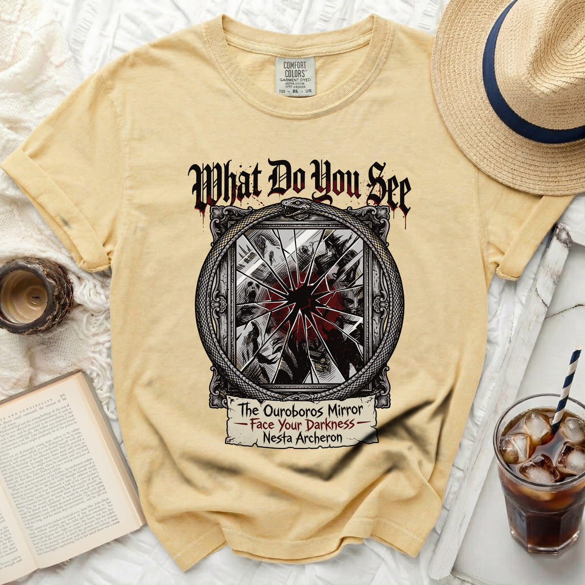Yellow t-shirt with "What Do You See" and "The Ouroboros Mirror - Face Your Darkness - Nesta Archeron" text.