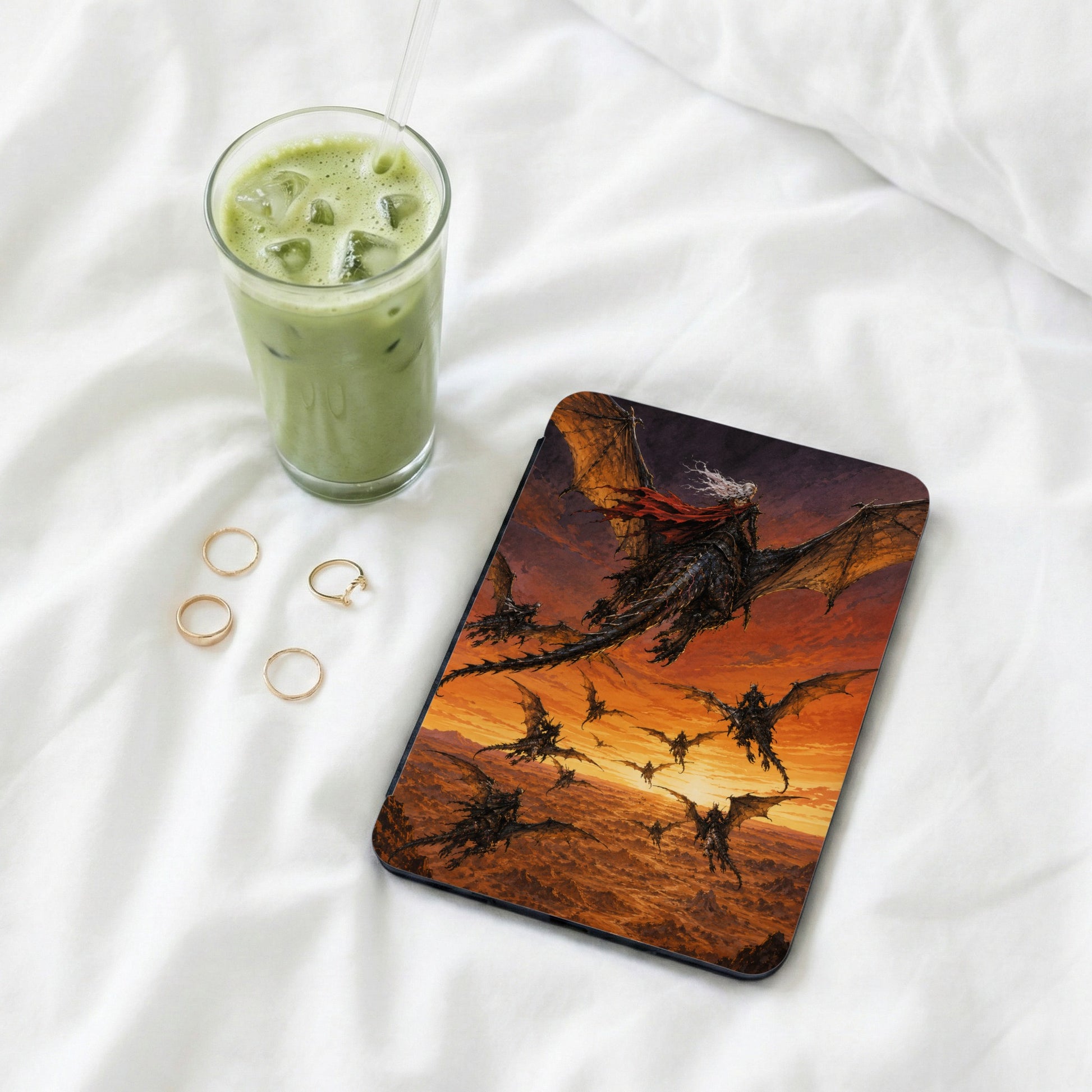 Tablet cover featuring dragon riders flying over desolate landscape during sunset.