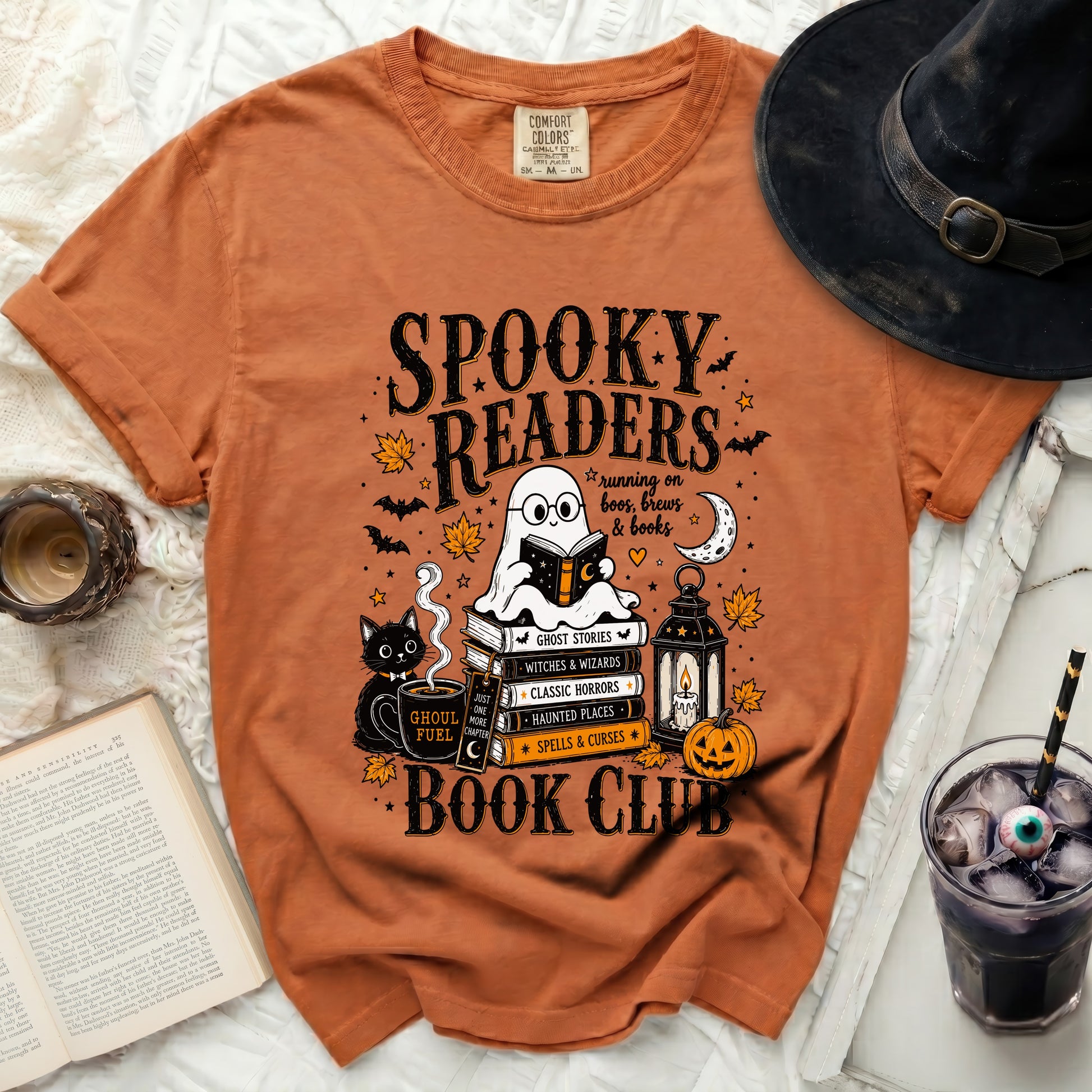 Spooky Readers Book Club ghost reading on books graphic tee.