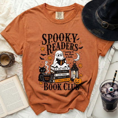 Spooky Readers Book Club ghost reading on books graphic tee.