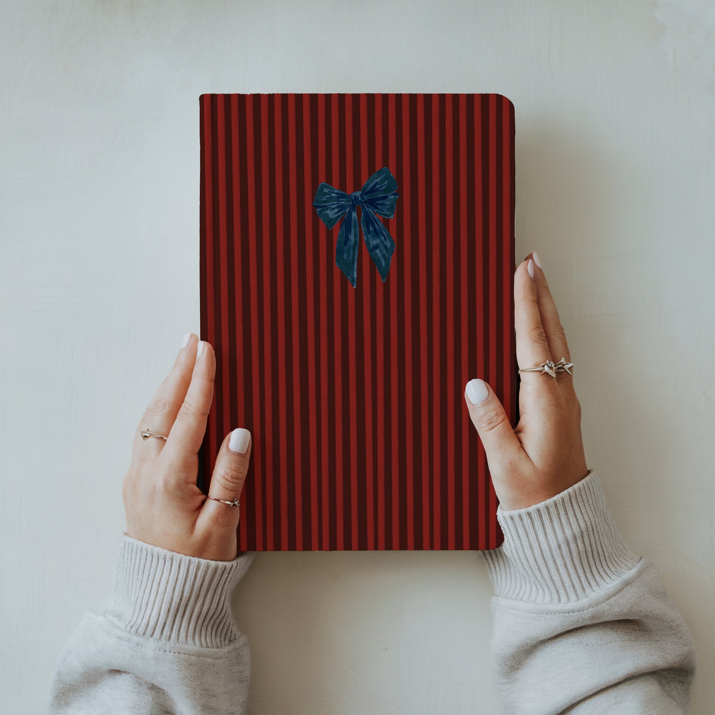Red Striped Notebook with Blue Bow Embellishment