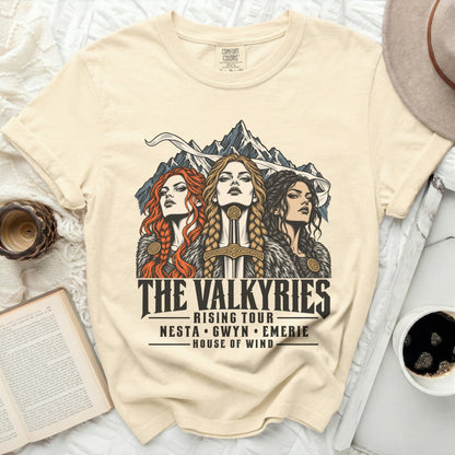 The Valkyries Rising Tour t-shirt features three women with mountains behind them.