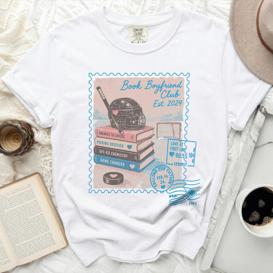 White t-shirt with "Book Boyfriend Club Est. 2024" graphic and genre labels.