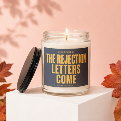 Lit candle in a jar with "The Rejection Letters Come" text.