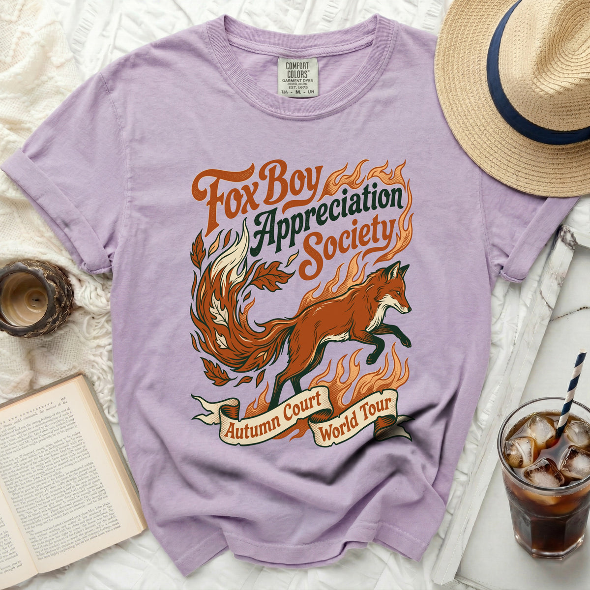 Lavender t-shirt with a jumping fox graphic and "Fox Boy Appreciation Society" text.