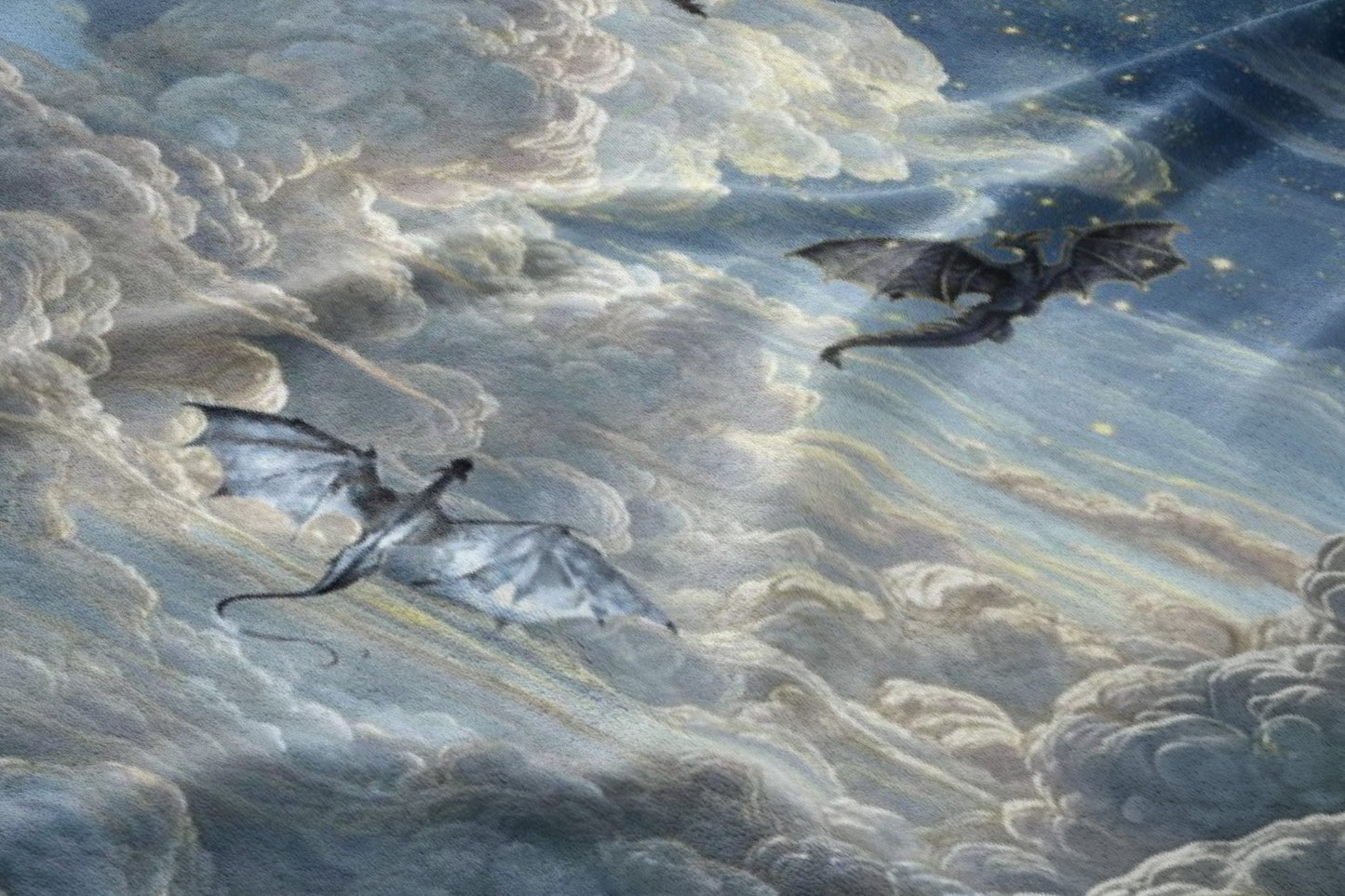 Two dragons fly through a cloudy night sky with stars and moon rays.