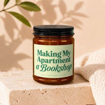 Candle with text "Making My Apartment a Bookshop" and "MagicMerch Emporium"