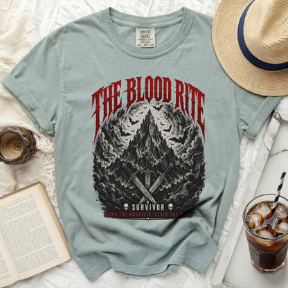Light green t-shirt with "The Blood Rite Survivor" graphic and swords.