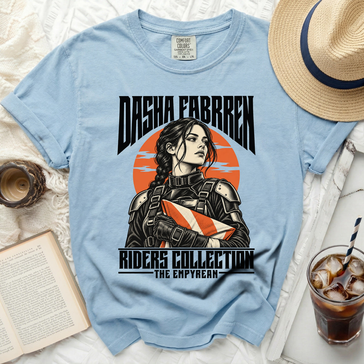 Light blue t-shirt with "Dasha Fabrren Riders Collection The Empyrean" graphic.