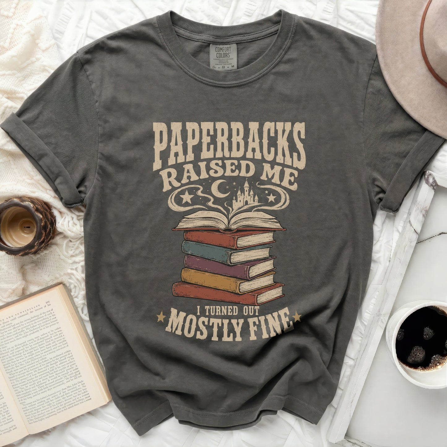 Paperbacks Raised Me, I Turned Out Mostly Fine graphic tee.