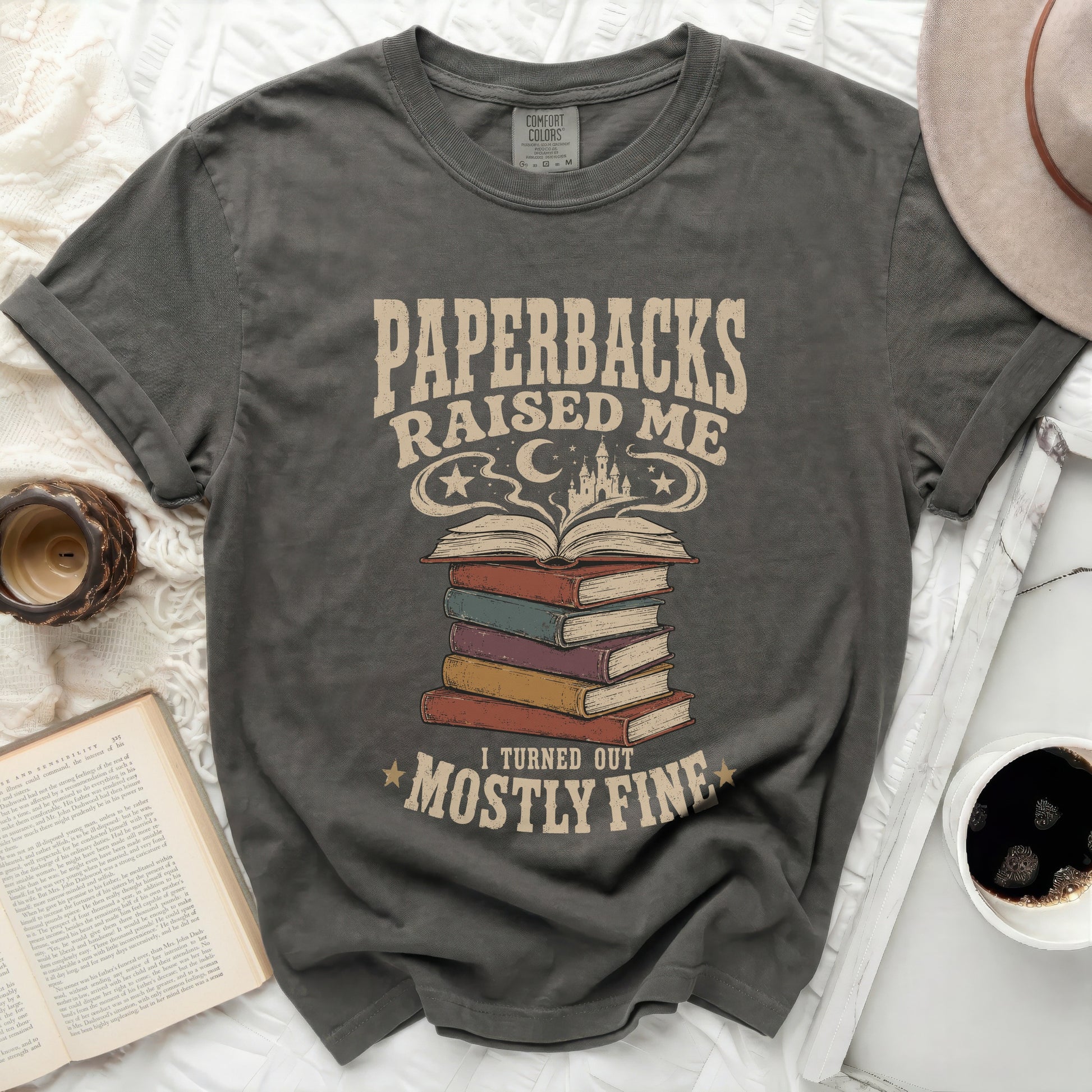 Paperbacks Raised Me, I Turned Out Mostly Fine graphic tee.