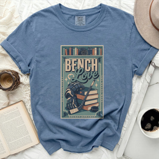 T-shirt with "Bench Love Hockey Romance" text and book illustrations.