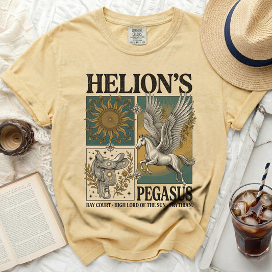Yellow t-shirt with Helion's Pegasus graphic, sun, and saddle.