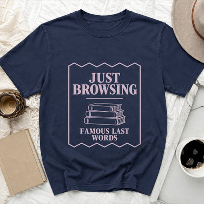 Navy t-shirt with "Just Browsing Famous Last Words" and stacked books graphic.
