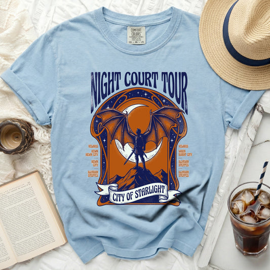 Light blue t-shirt with "Night Court Tour" and fantasy graphic.