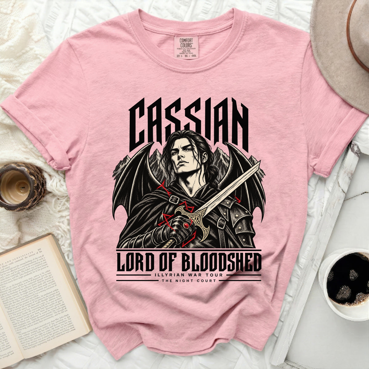 Pink t-shirt with black graphic of Cassian, Lord of Bloodshed, holding a sword.