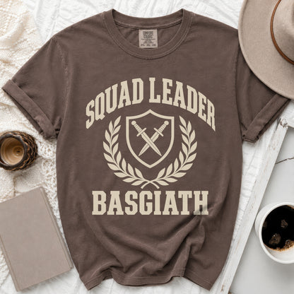 Brown t-shirt with "SQUAD LEADER BASGIATH" text and a shield with swords.