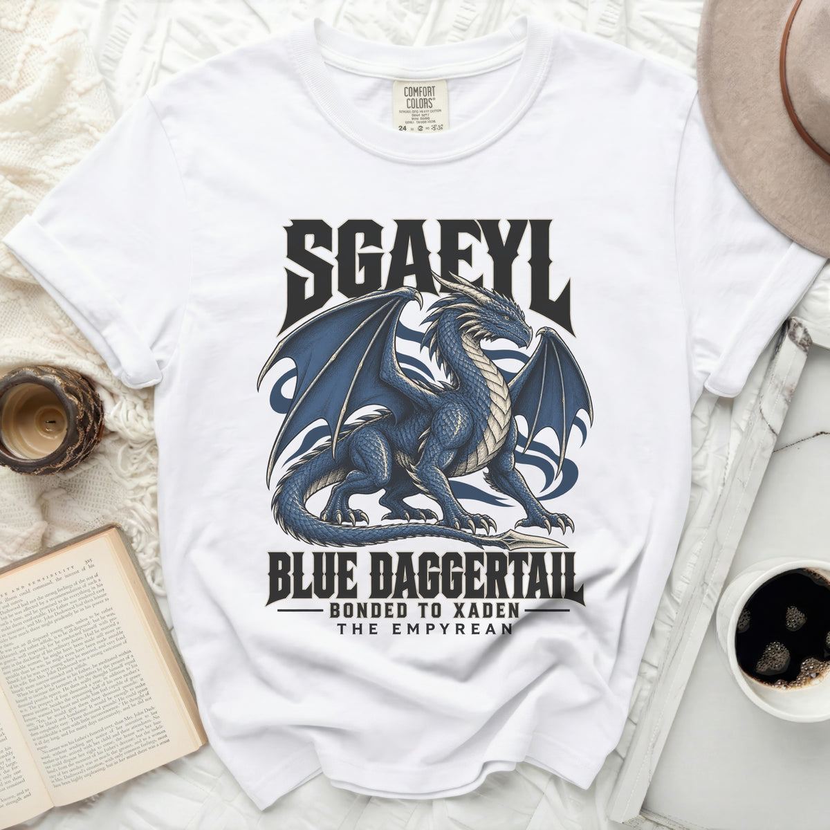 White t-shirt with blue dragon graphic and text SGAFYL, BLUE DAGGERTAIL, BONDED TO XADEN, THE EMPYREAN.