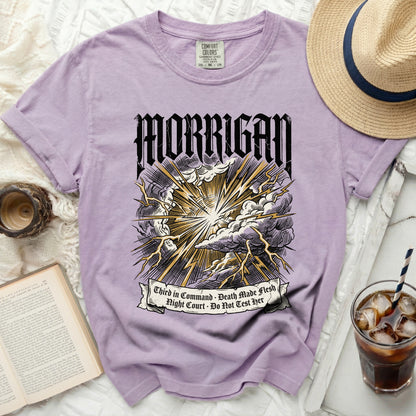 Purple t-shirt with Morrigan lightning graphic and text.
