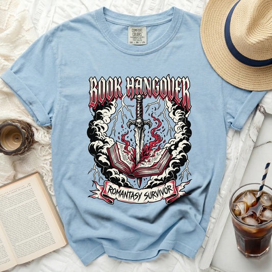 Blue t-shirt with "BOOK HANGOVER ROMANTASY SURVIVOR" graphic.