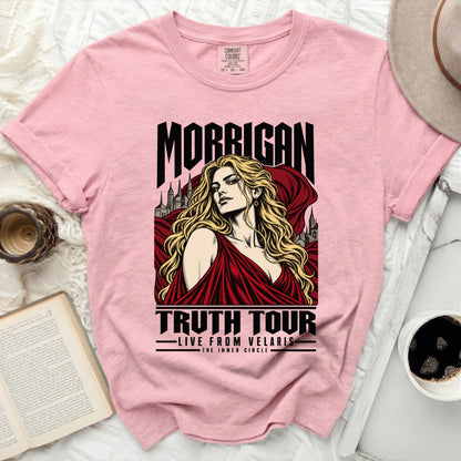 Pink t-shirt with graphic of "Morrigan Truth Tour Live from Velaris The Inner Circle."