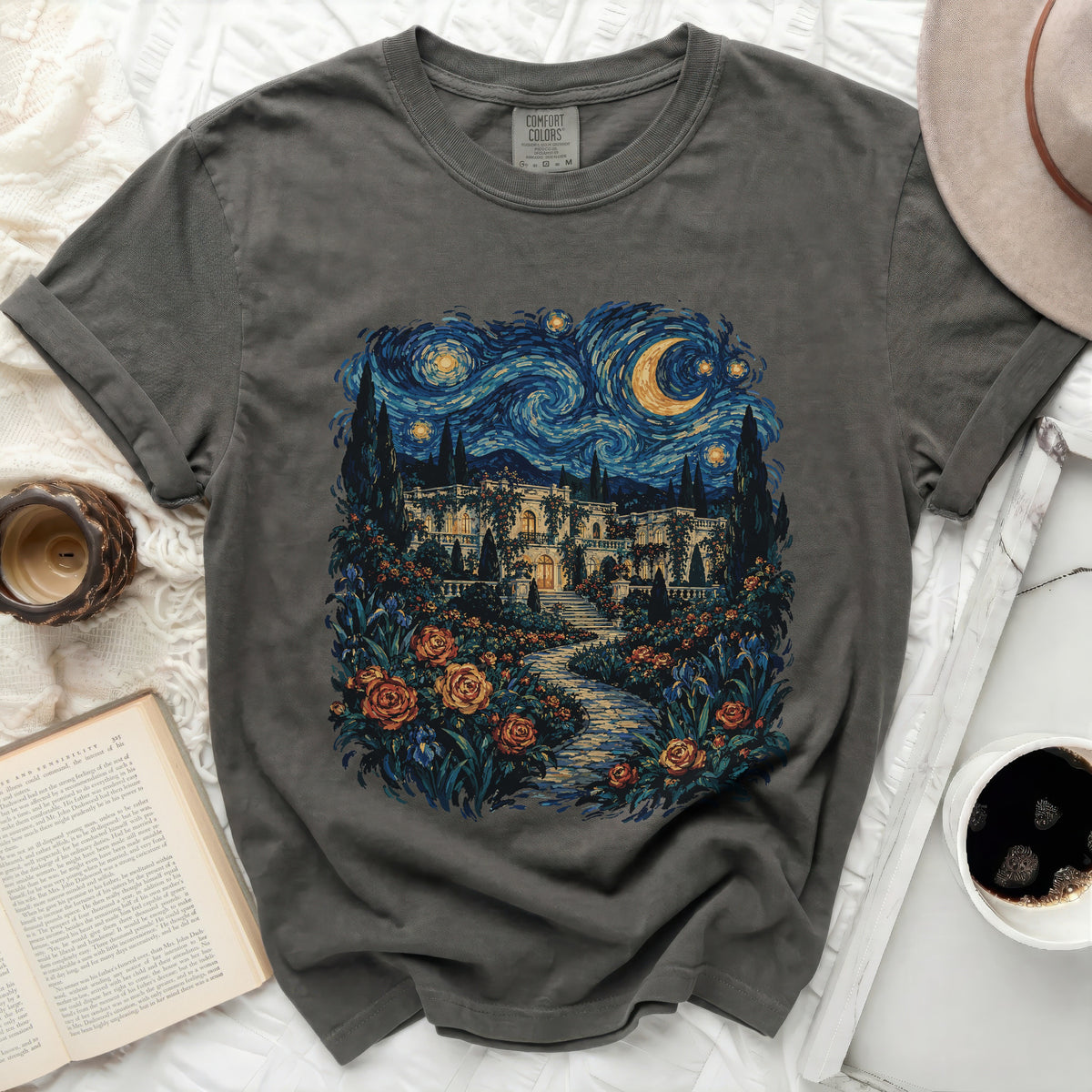 Dark gray t-shirt with starry night sky, villa, and rose garden print.