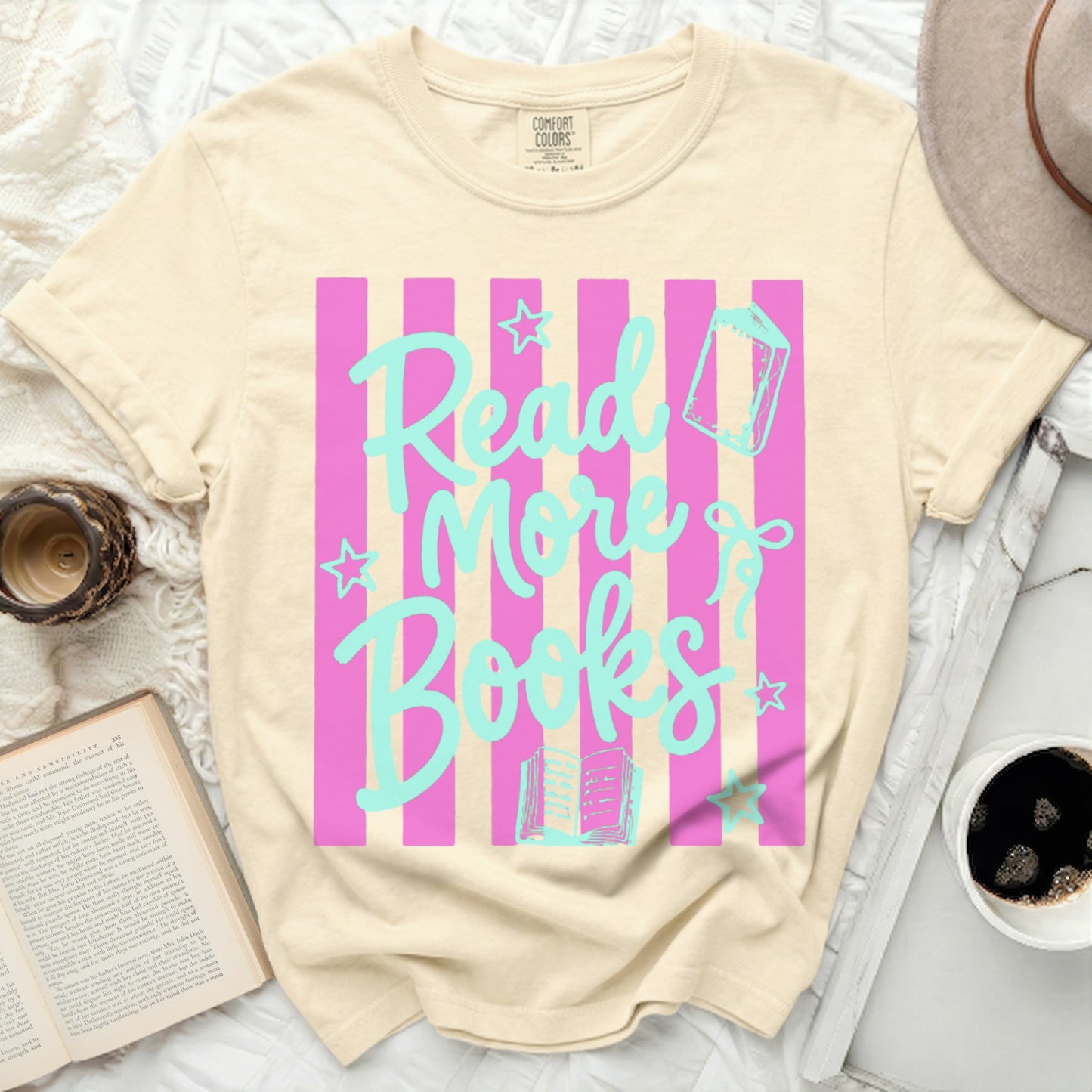Beige t-shirt with pink stripes and "Read More Books" text.
