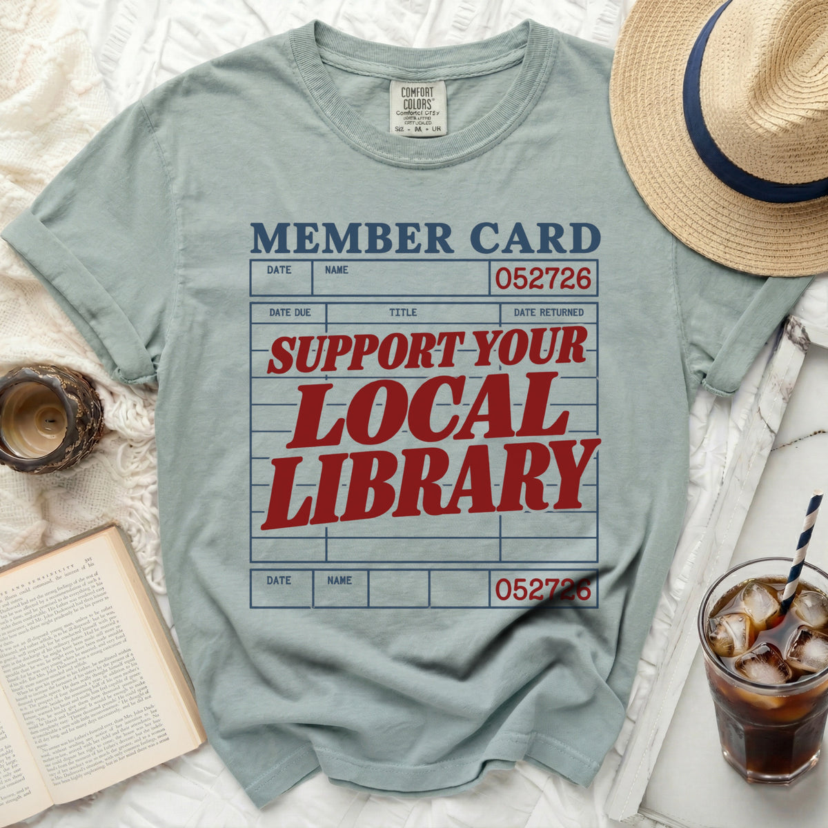 Comfort Colors t-shirt with "Member Card: Support Your Local Library" graphic.