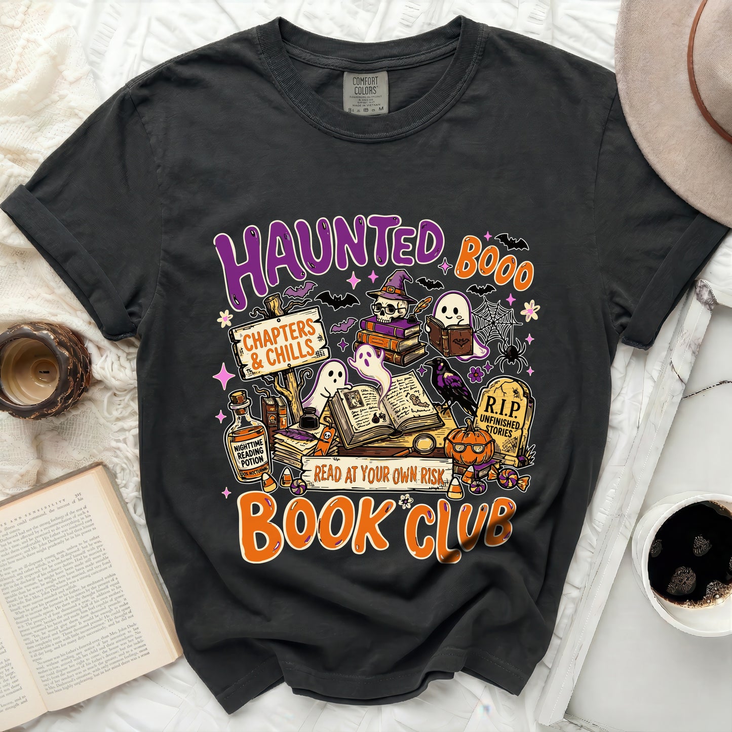 Haunted Book Club t-shirt with Halloween-themed illustrations and text.