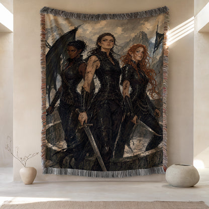 three women dressed in black, each holding a sword and standing in a group.