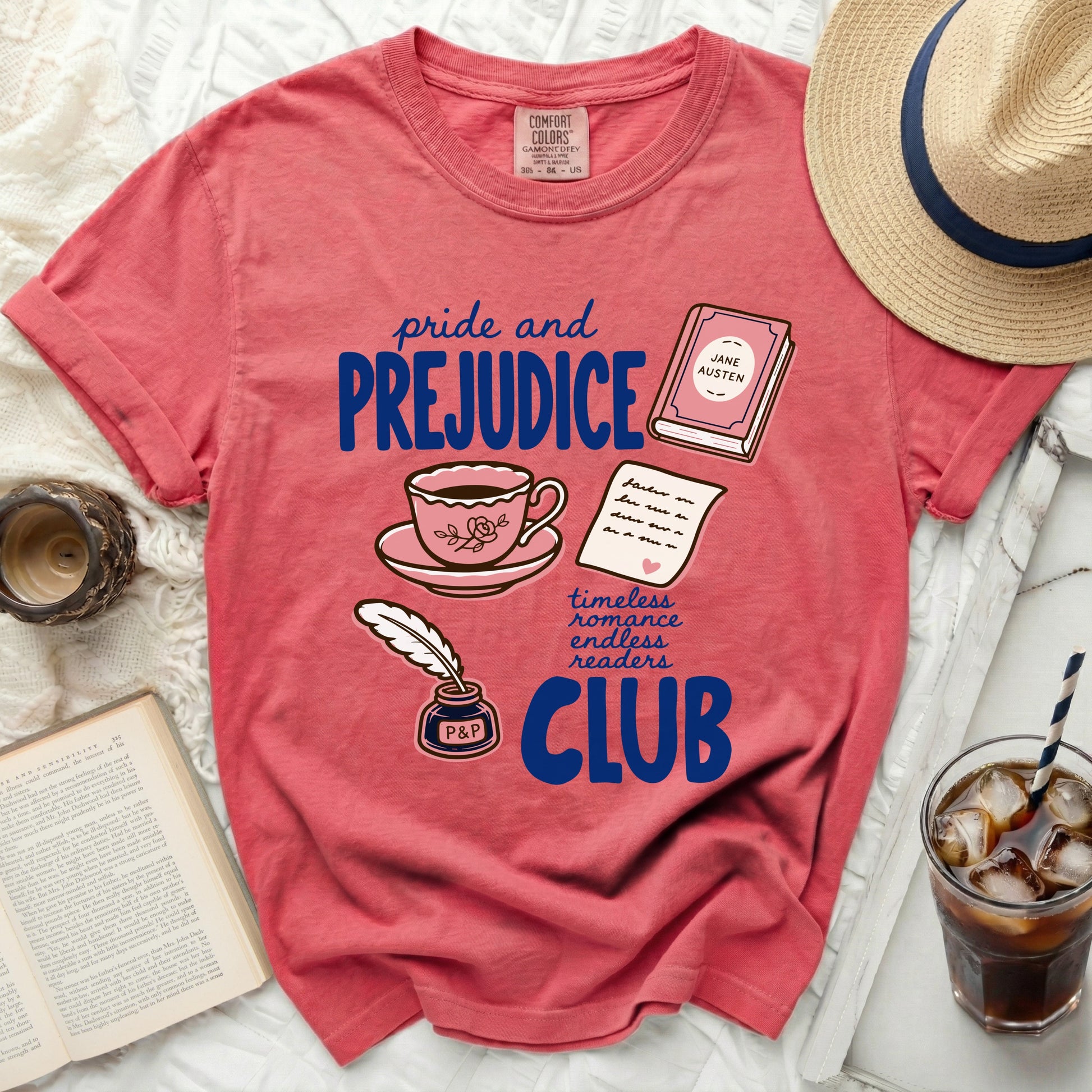 Pink t-shirt with "Pride and Prejudice Club" literary design.