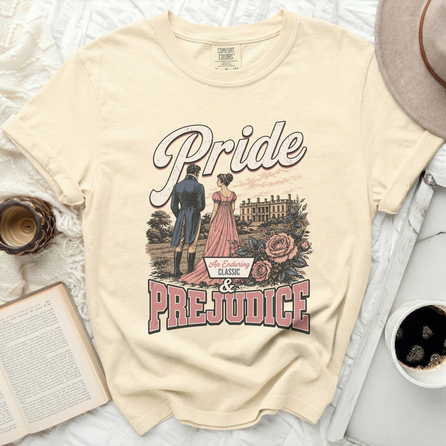 Pale yellow t-shirt with "Pride & Prejudice" graphic.