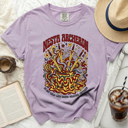 Purple t-shirt with "Nesta Archheron" and cauldron graphic.