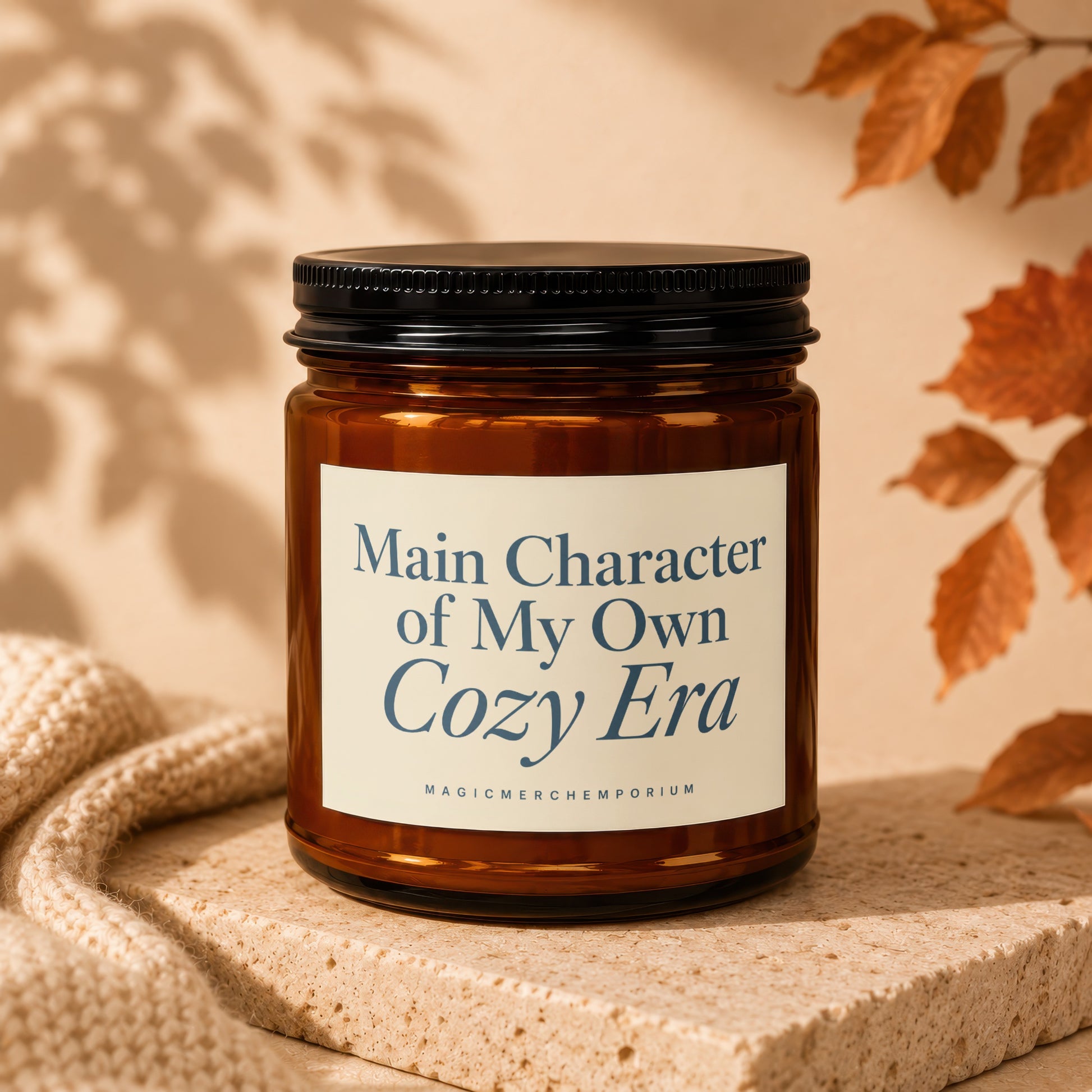 Amber jar candle with label reading "Main Character of My Own Cozy Era."