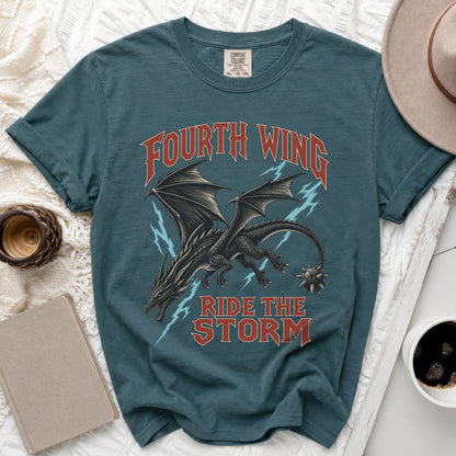 Teal t-shirt with a black dragon and text "FOURTH WING RIDE THE STORM."