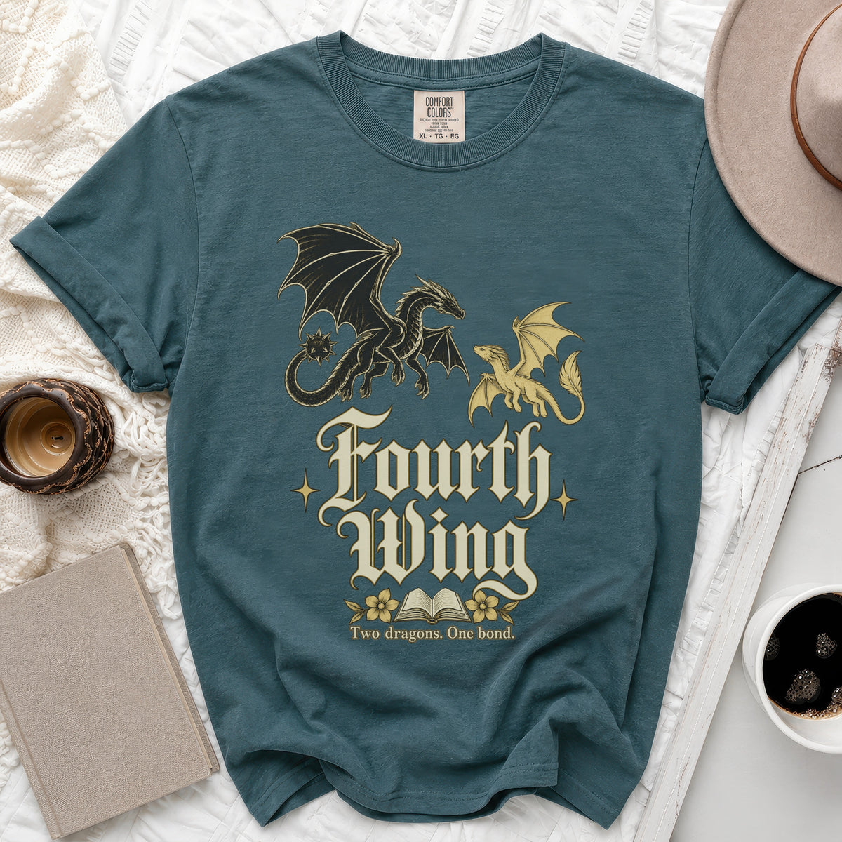 Teal t-shirt with "Fourth Wing" text and two dragons, "Two dragons. One bond."