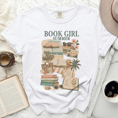 White t-shirt with "BOOK GIRL" and beach, book, and summer graphics.