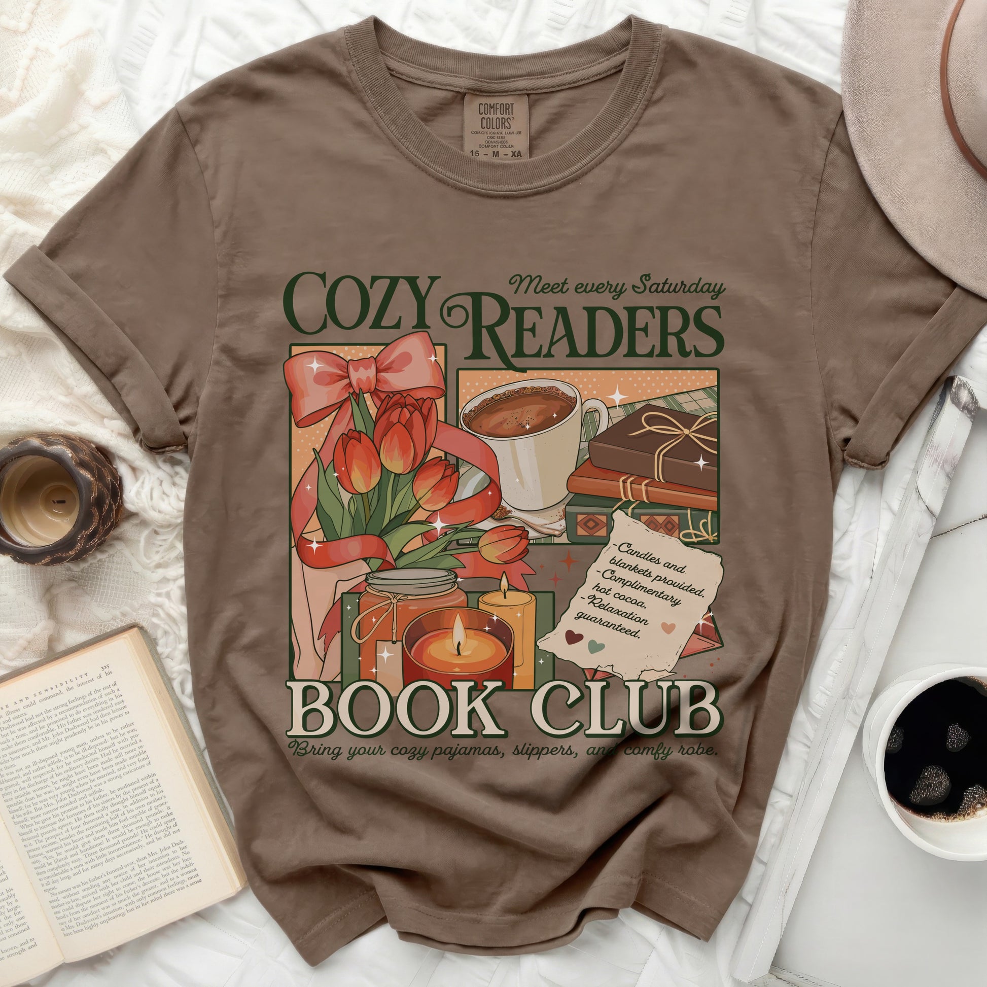 "Cozy Readers Book Club" graphic on a brown t-shirt with tulips and hot cocoa.