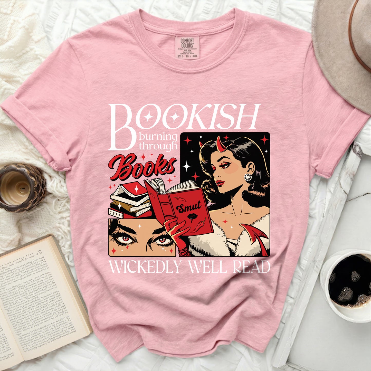 Pink t-shirt graphic: "Bookish burning through Books Smut Wickedly Well Read" with devilish woman.