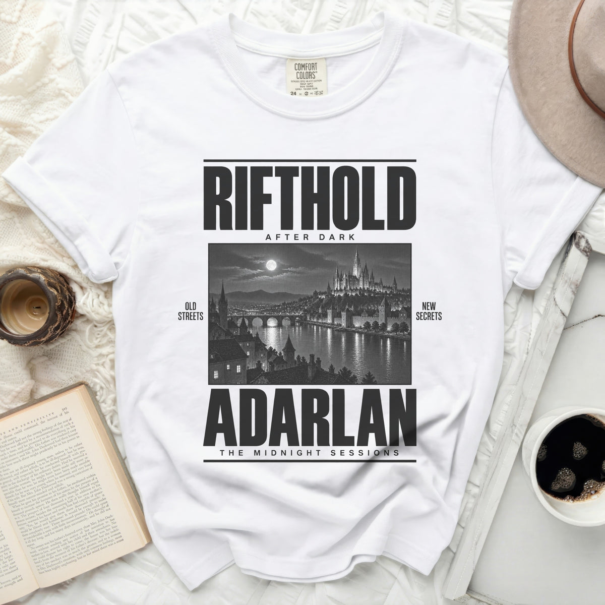 White t-shirt with black text "RIFTHOLD AFTER DARK" and "ADARLAN THE MIDNIGHT SESSIONS".