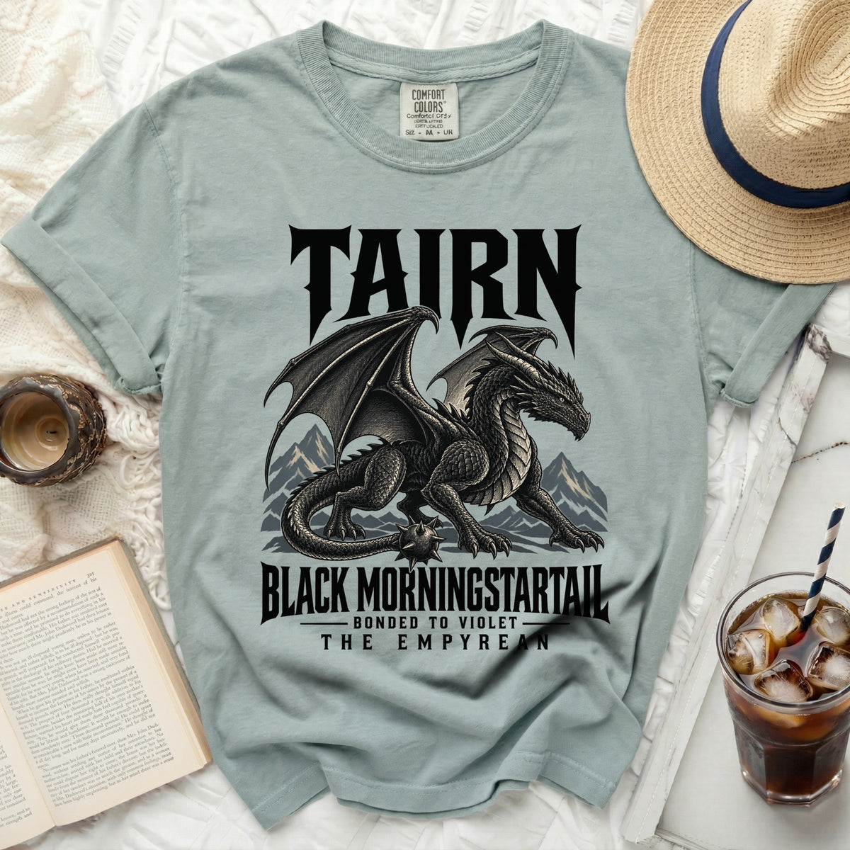 T-shirt with black dragon graphic and text "TAIRN BLACK MORNINGSTARTAIL THE EMPYREAN".