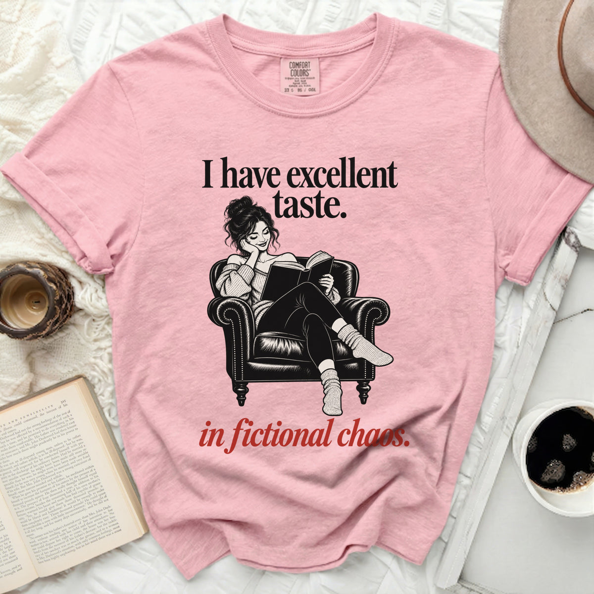 Pink t-shirt with graphic "I have excellent taste. in fictional chaos."