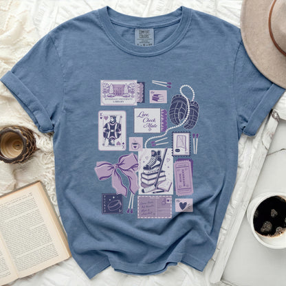 T-shirt with various illustrations of hockey and romantic themes, including cards, matches, and a book.