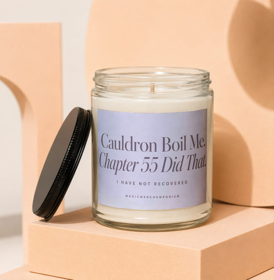 Candle with label reading "Cauldron Boil Me. Chapter 55 Did That. I HAVE NOT RECOVERED MAGICMERCH...".