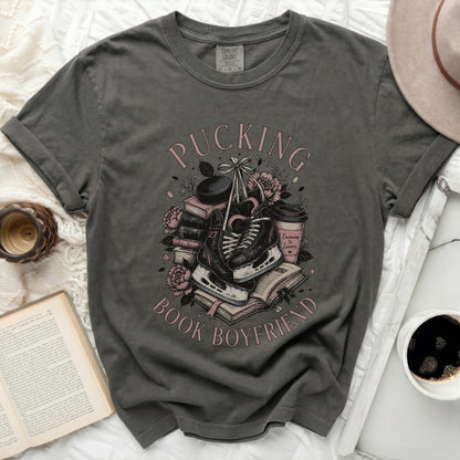 Dark gray t-shirt with "Pucking Enemies to Lovers Book Boyfriend" text and ice skates.