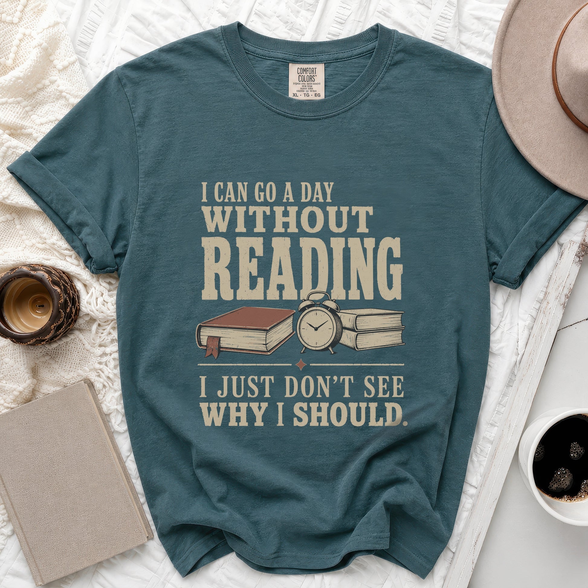 Teal t-shirt with "I can go a day without reading, I just don't see why I should."