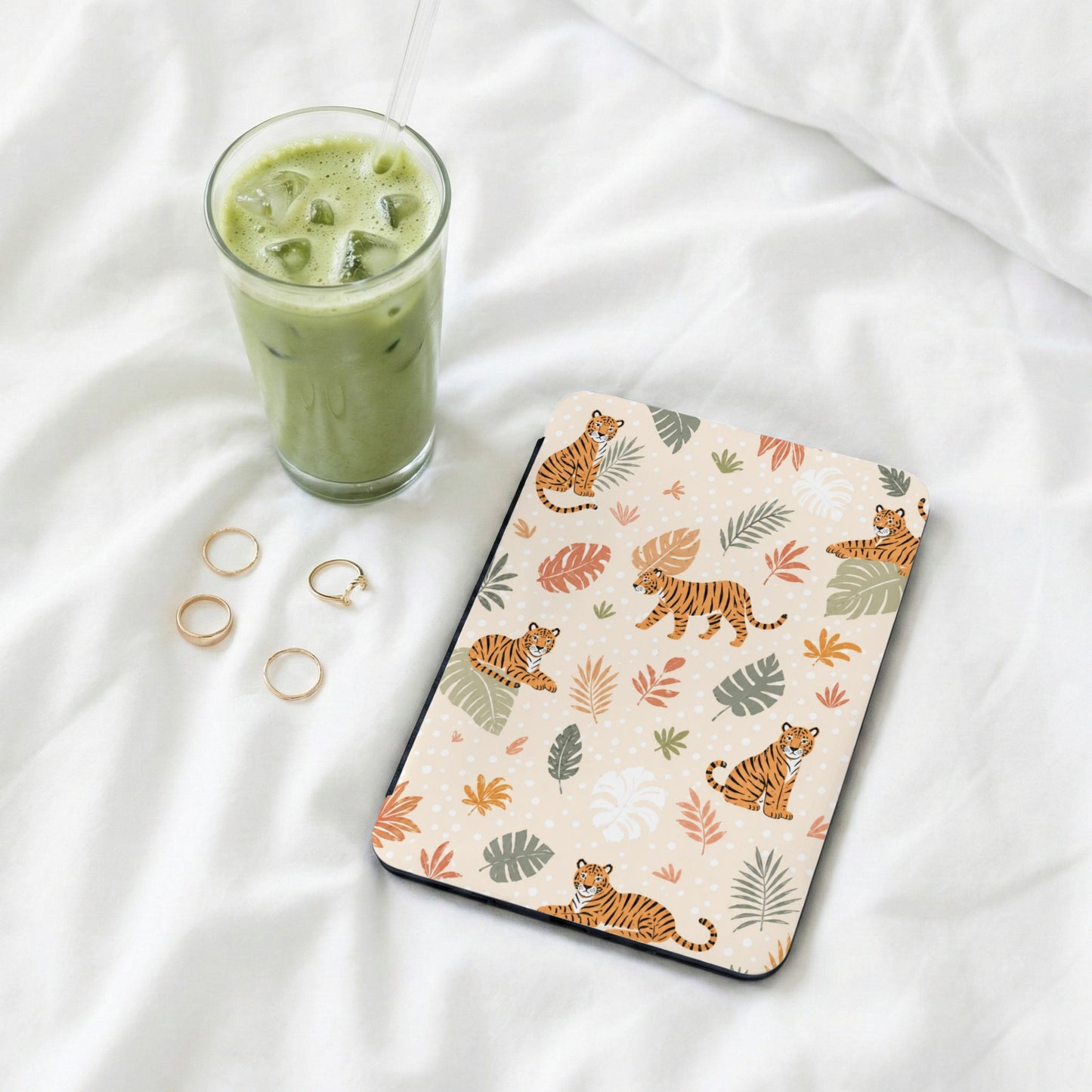 Tan mousepad with pattern of tigers and tropical leaves